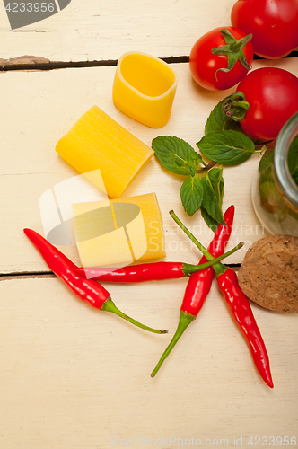 Image of Italian pasta paccheri with tomato mint and chili pepper