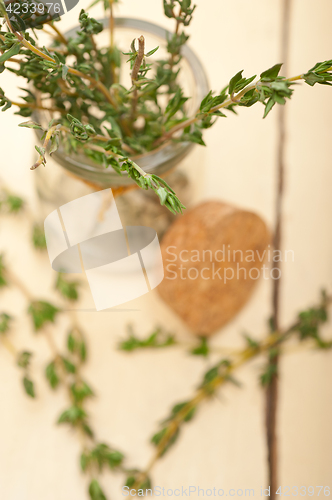 Image of fresh thyme on a glass jar