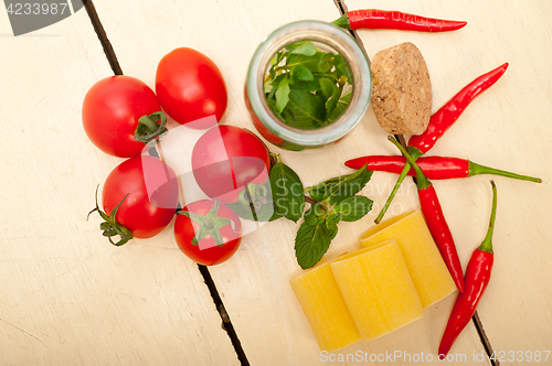 Image of Italian pasta paccheri with tomato mint and chili pepper