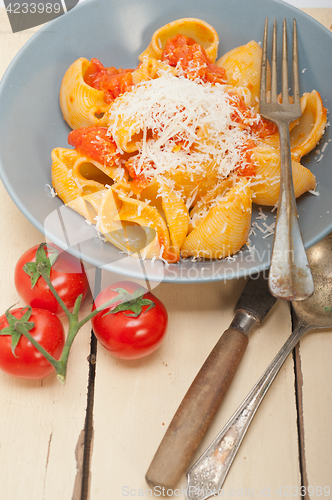 Image of Italian snail lumaconi pasta with tomatoes