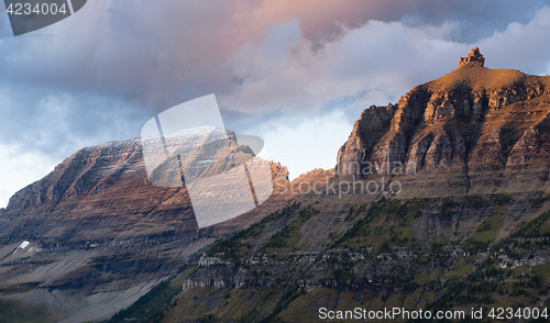 Image of Clouds Move Over Mountains Logan's Pass Glacier National Park