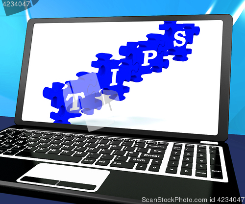 Image of Tips Puzzle On Laptop Shows Internet Guide