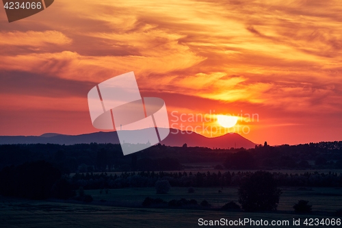 Image of Sunset Hilly Landscape