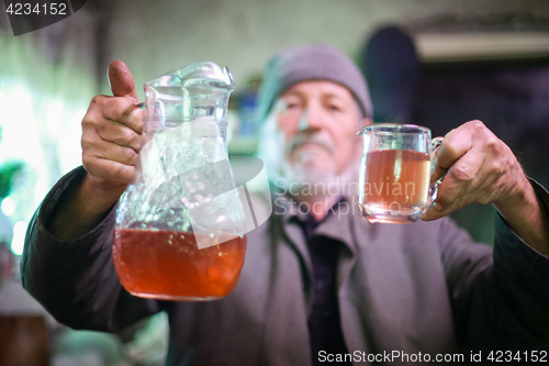 Image of Man drinking wine