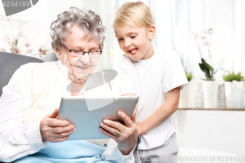 Image of Grandmother and grandson. Family, grandmother with grandson.