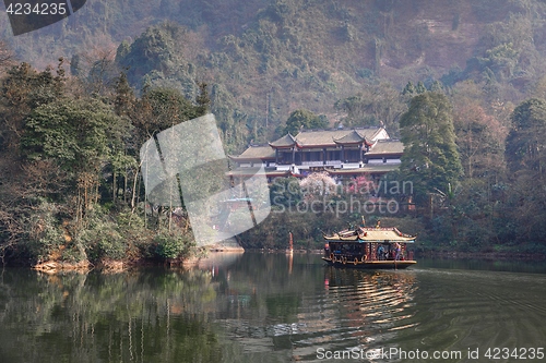 Image of Large lake between mountains under sky