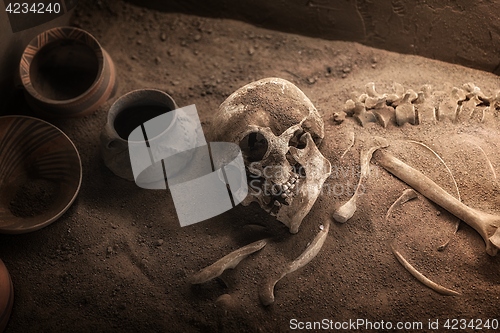 Image of Ancient skeleton lying in grave