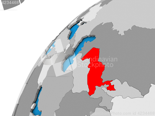 Image of Uzbekistan on globe in red