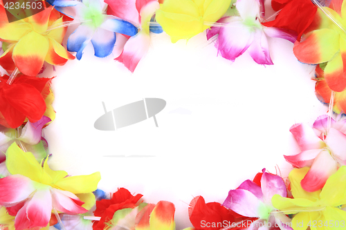 Image of color plastic hawaii flowers background