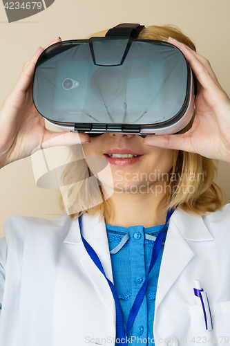 Image of Girl in white lab coat