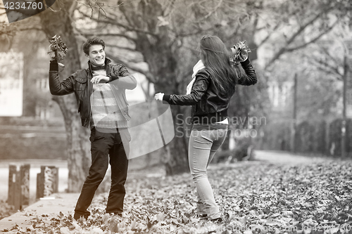 Image of Happy young Couple in Autumn Park