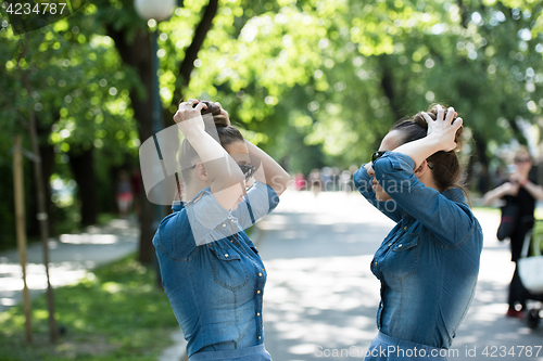 Image of twin sister with sunglasses