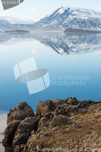 Image of Icelandic mountains with the amazing lagoon in winter