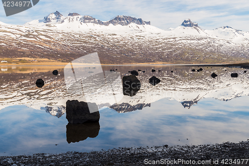 Image of Icelandic mountains with the amazing lagoon in winter