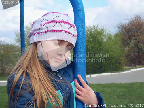 Image of Beautiful schoolgirl outdoors 