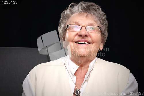 Image of Smiling older woman. Grandmother. Cheerful old man.