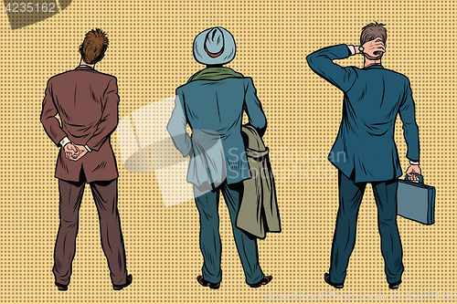 Image of Three retro businessman standing back