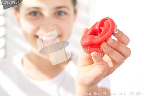 Image of The hearing aid for a child. The choice of hearing aid hearing care professional