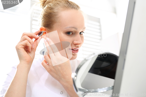 Image of Hearing Impaired. Hearing. Hearing aid. 