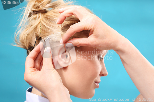 Image of Hearing Impaired. Hearing. Hearing aid. 