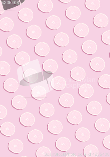 Image of The lemon pattern on pink background. Minimal concept.