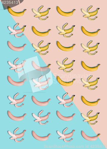 Image of The group of bananas against blue and pink background