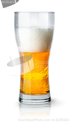 Image of Half glass of light beer with foam