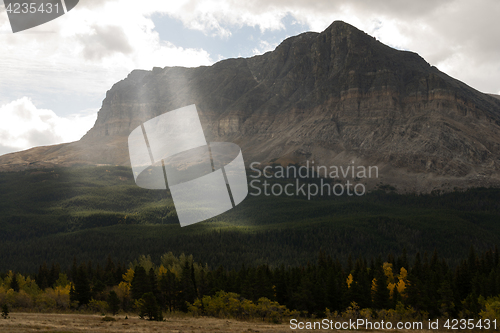 Image of Sun Rays Break Clouds Rocky Mountains Montana Western State USA