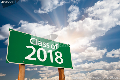 Image of Class of 2018 Green Road Sign with Dramatic Clouds and Sky