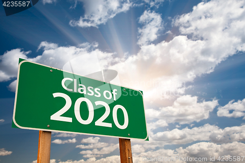 Image of Class of 2020 Green Road Sign with Dramatic Clouds and Sky