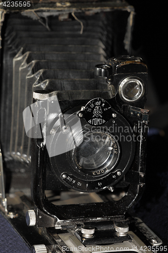 Image of retro camera Large format black background