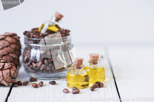 Image of The cedar oil in a glass bottle