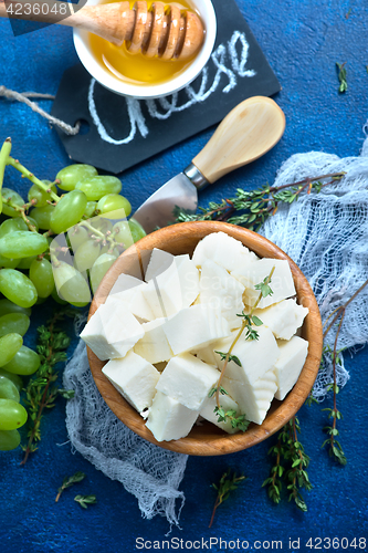 Image of cheese with grape