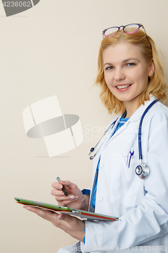 Image of Doctor with phonendoscope at work