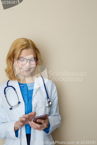 Image of Young woman on empty background