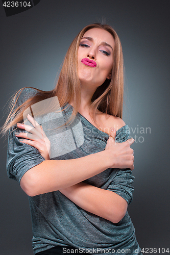 Image of The young woman\'s portrait with Seductive emotions