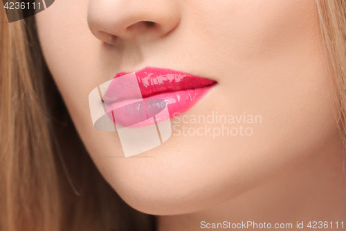 Image of The sensual red lips close up