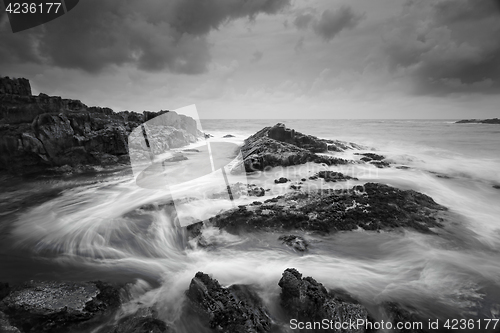 Image of Seascape with moody weather and swirling ocean flows