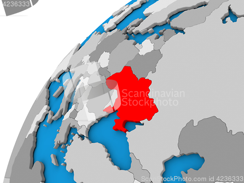 Image of Ukraine on globe in red