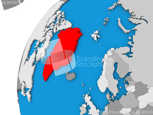 Image of Greenland on globe in red