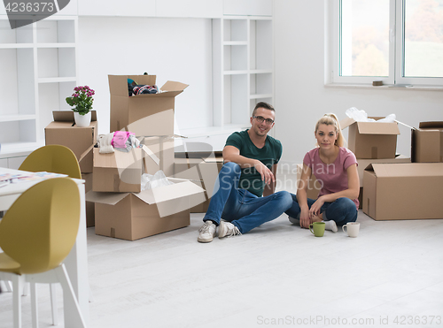 Image of young couple in new house