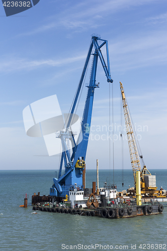 Image of crane barge doing marine heavy lift installation works in the gulf or the sea