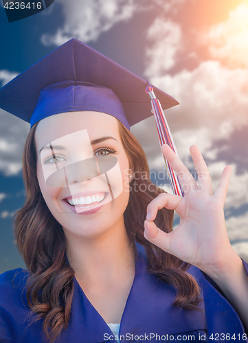 Image of Happy Graduating Mixed Race Woman In Cap and Gown