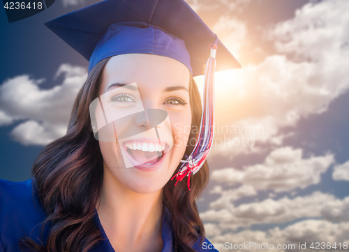 Image of Happy Graduating Mixed Race Woman In Cap and Gown