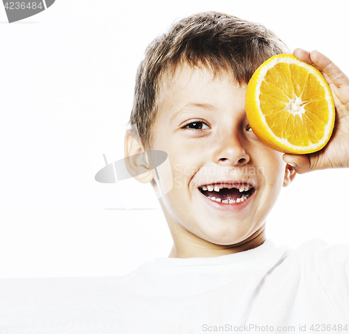 Image of little cute boy with orange fruit double isolated on white smili