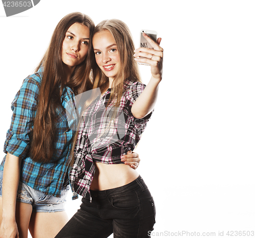 Image of cute teenage girls making selfie isolated