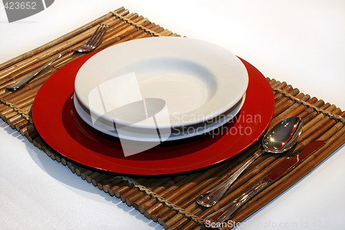 Image of Plate over bamboo