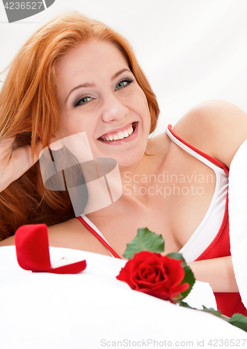 Image of Beautiful girl on bed