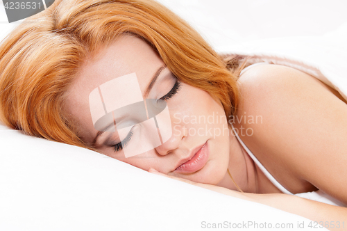 Image of Beautiful girl on bed