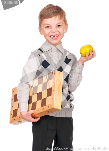 Image of Little boy with chessboard